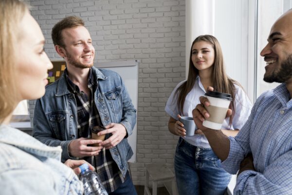 leisurely chatting teammates at a start-up company